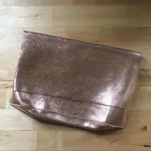 Rosegold metallic leather zip clutch